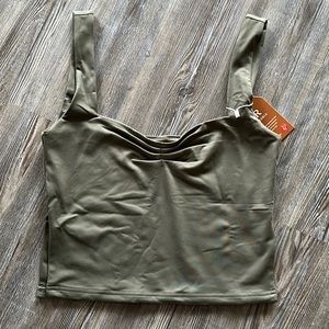 New with tags! Green Size M tank top with side slits and scrunch top!